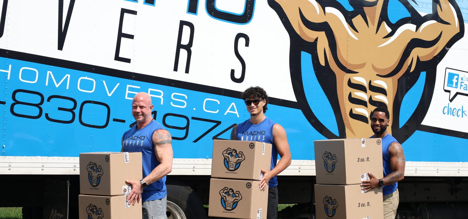 Local movers in Oakville Ontario loading furniture and moving boxes into a moving truck